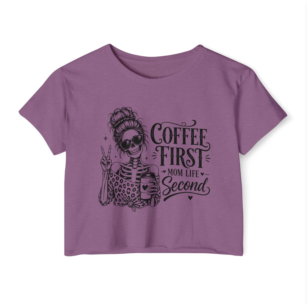 Purple t-shirt with skeleton design and text 'Coffee First, Mom Life Second' on a white background
