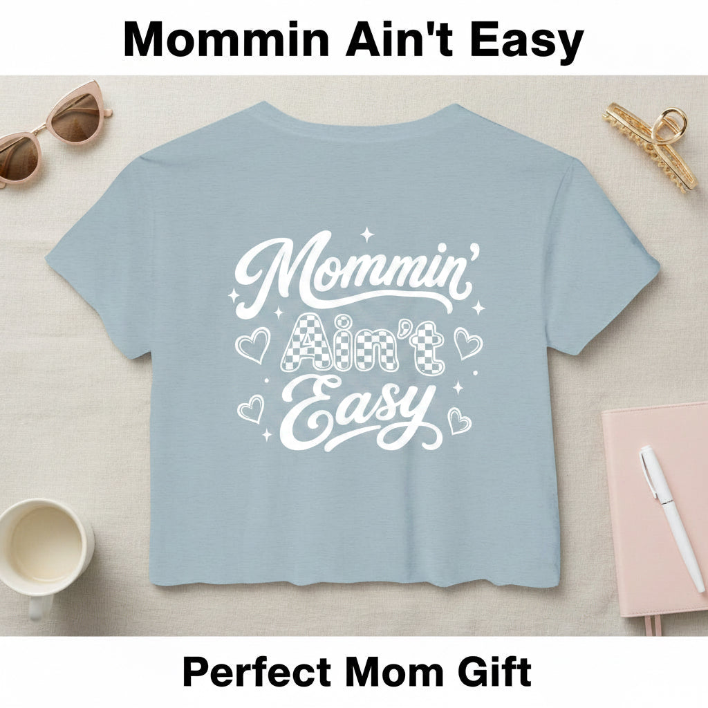 Light blue Mommin Ain’t Easy crop top product image for busy moms and funny mom gifts.