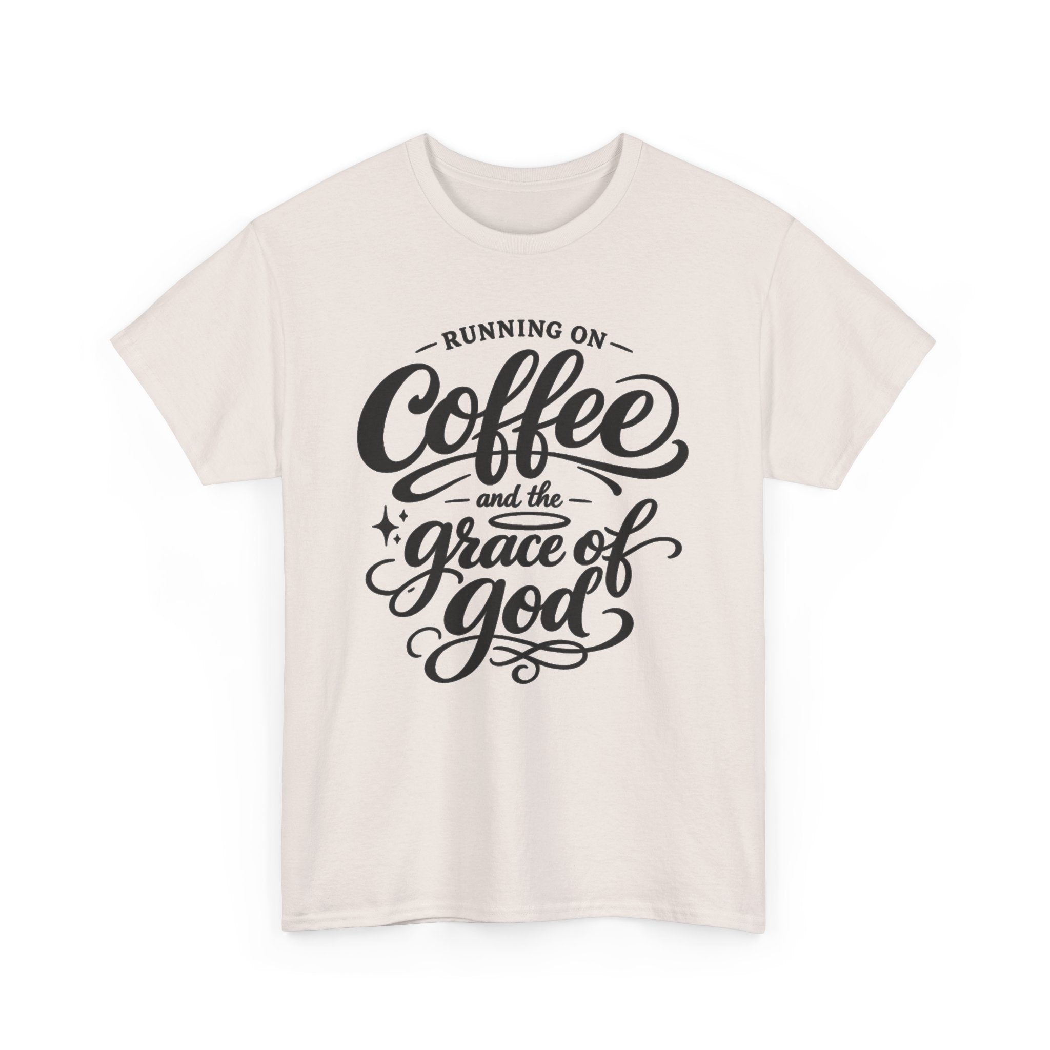 A light beige crewneck t-shirt with a black graphic text print reading 'RUNNING ON Coffee and the grace of god' on the front, displayed against a solid white background.