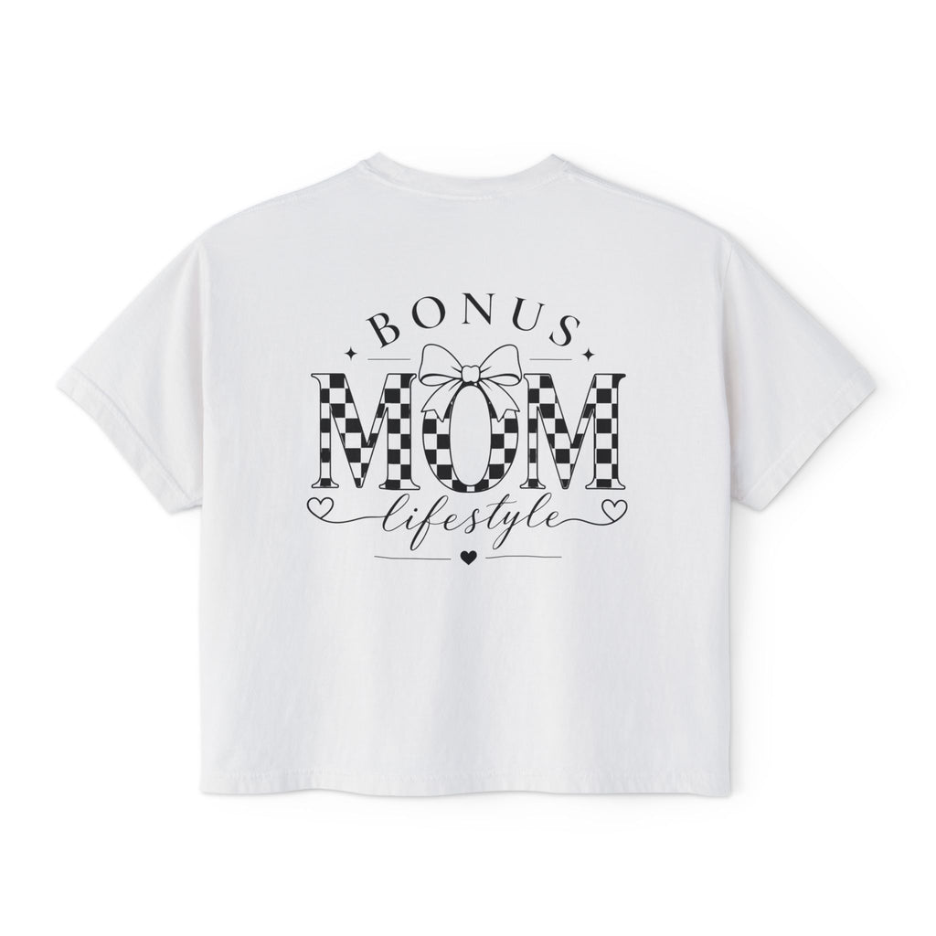 White t-shirt with 'Bonus Mom Lifestyle' text and checkered design on a white background