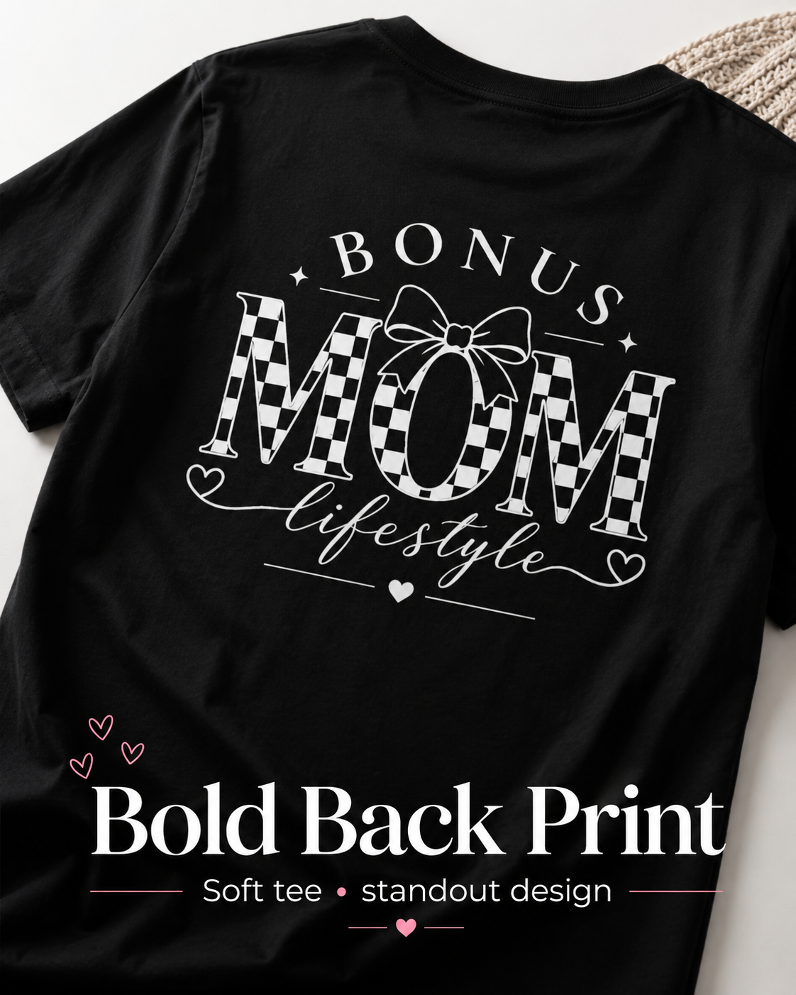 Black t-shirt with 'Bonus Mom Lifestyle' text and checkered design on a white background