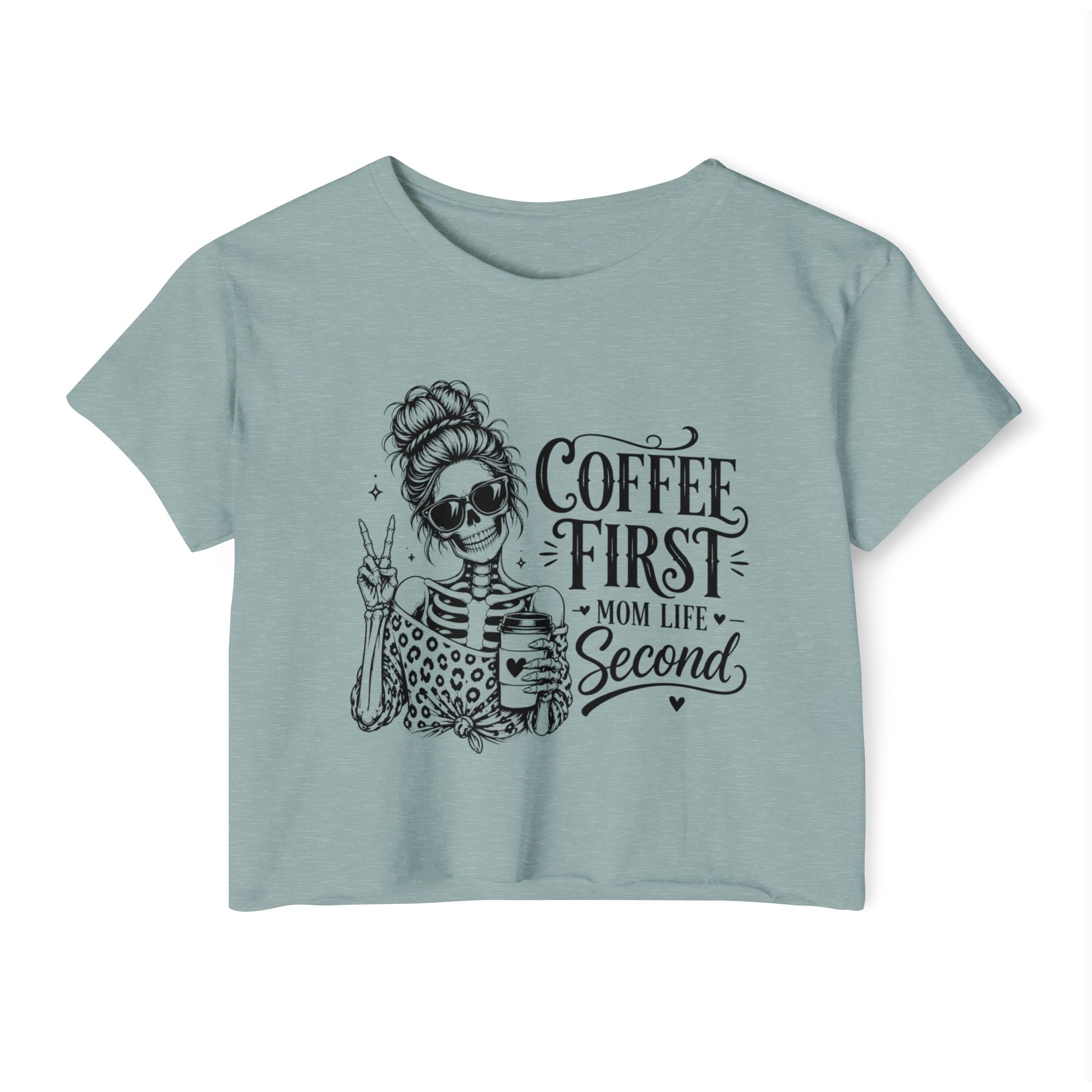 Light blue t-shirt with skeleton graphic and text 'Coffee First, Mom Life Second' on a white background