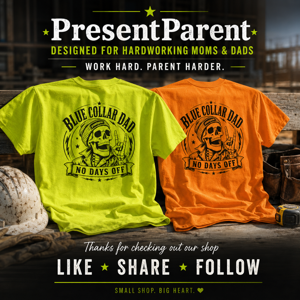 Two t-shirts, one green and one orange, with 'Blue Collar Dad' design on a wooden surface.