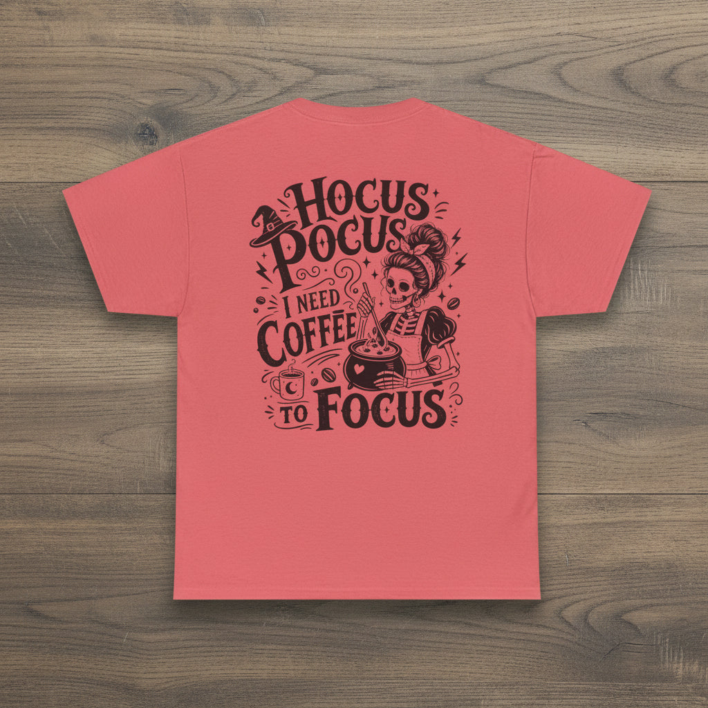 Pink women’s coffee graphic tee with black Hocus Pocus I Need Coffee to Focus skeleton coffee design on the back.