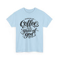 A light blue short-sleeve crewneck t-shirt with a black graphic text print reading 'RUNNING ON Coffee and the grace of god' on the front, displayed against a solid white background.