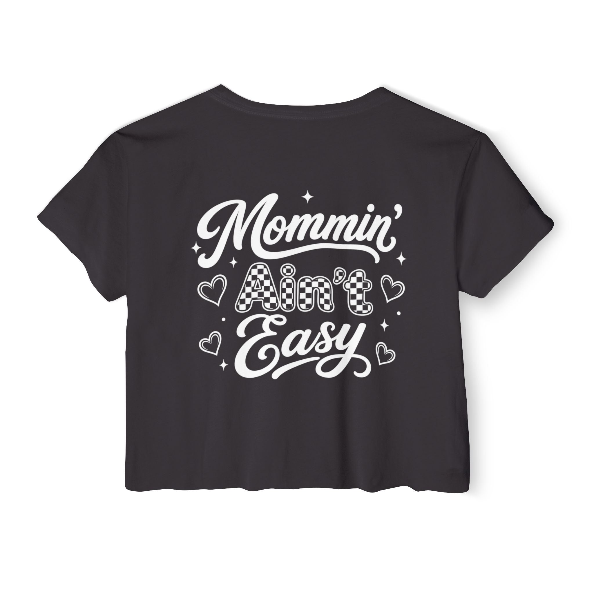 Women’s Mommin Ain’t Easy crop top with white text graphic shown on a white background.
