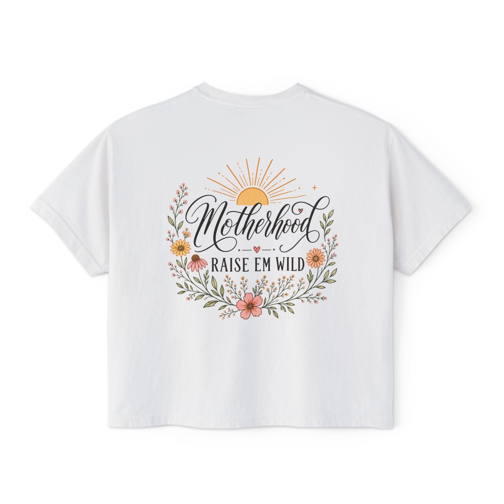 White t-shirt with 'Motherhood' and 'Raise Em Wild' text and floral design on a white background