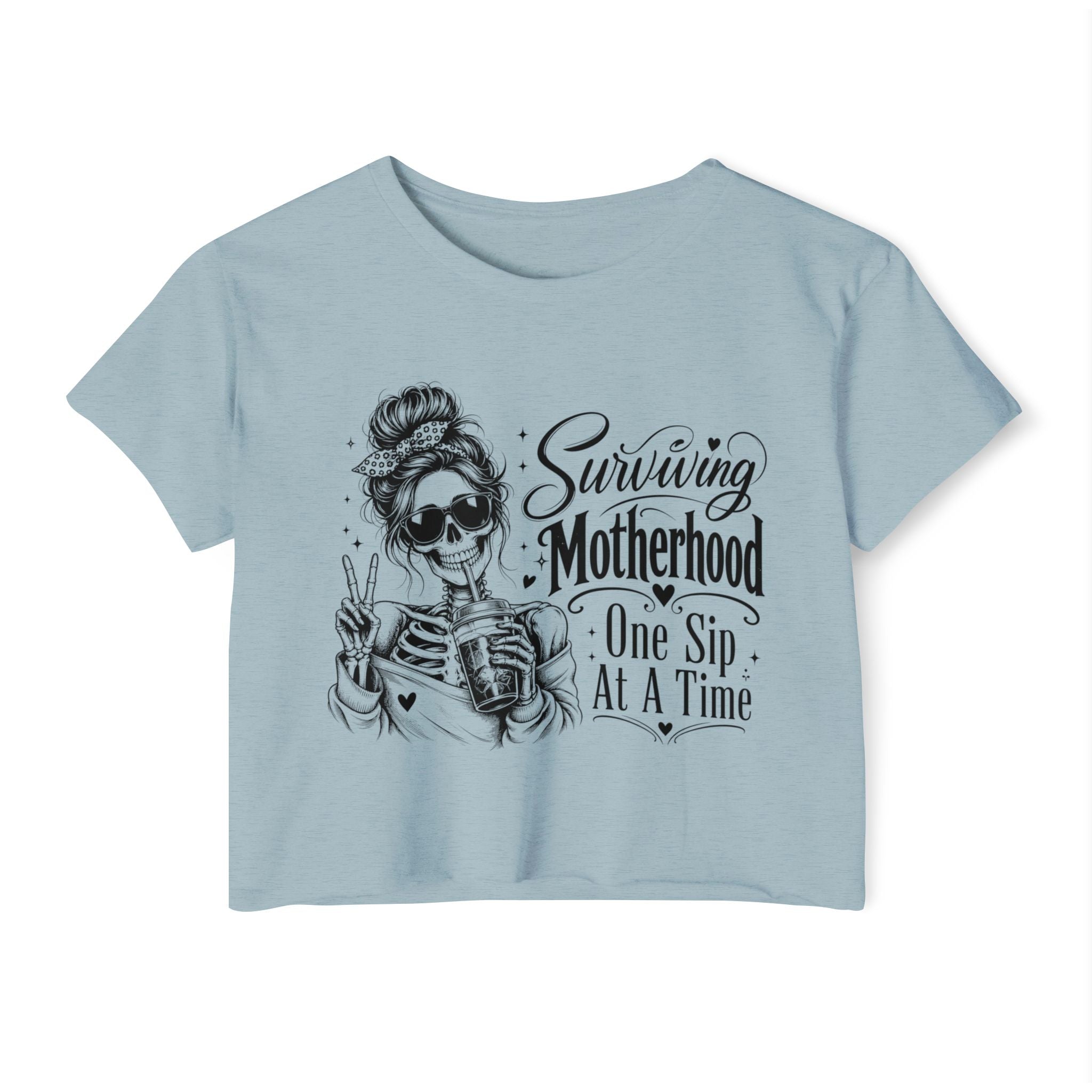Surviving Motherhood graphic crop top product image for moms running on caffeine.