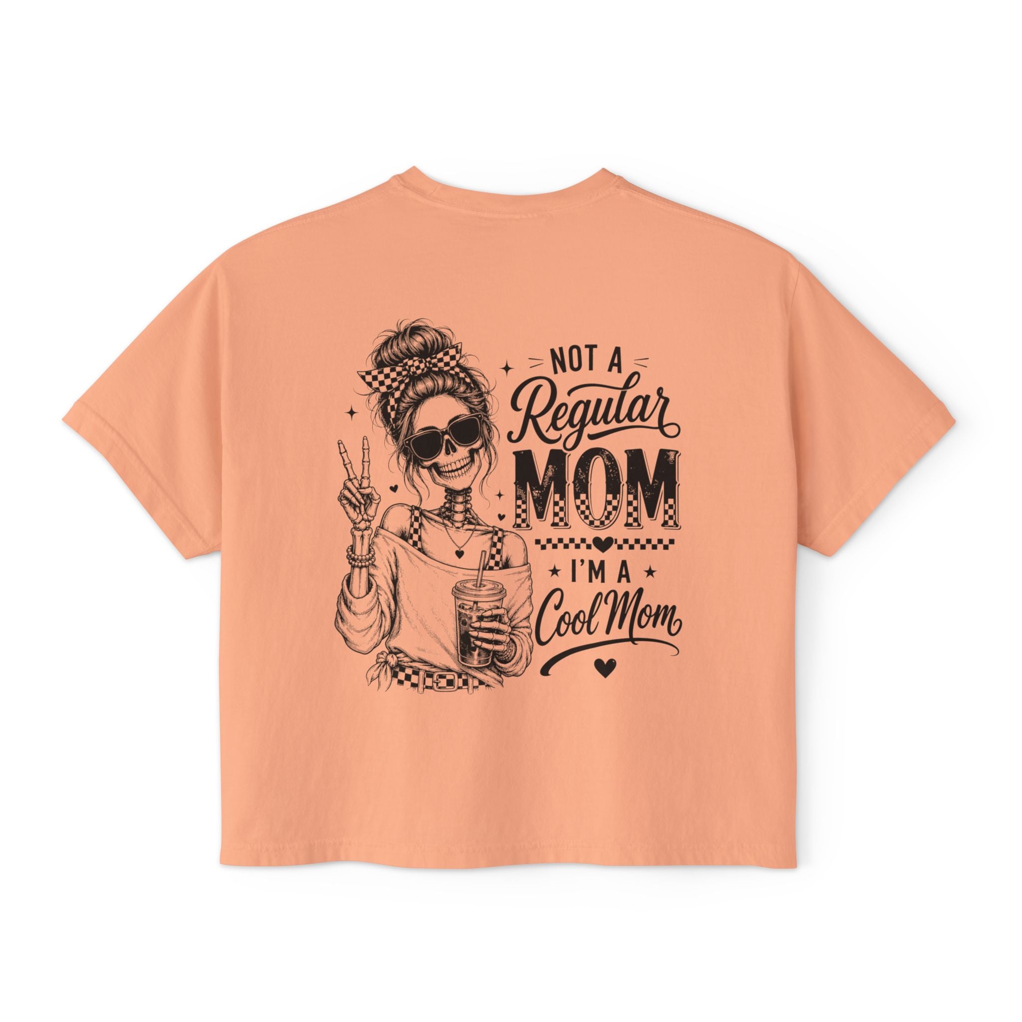 Women’s peach boxy cropped tee with black Cool Mom skeleton coffee graphic on the back.