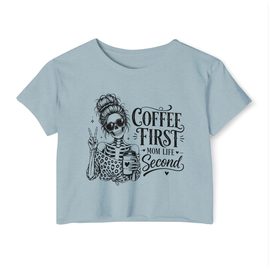 Light blue t-shirt with skeleton graphic and text 'Coffee First, Mom Life Second' on a white background