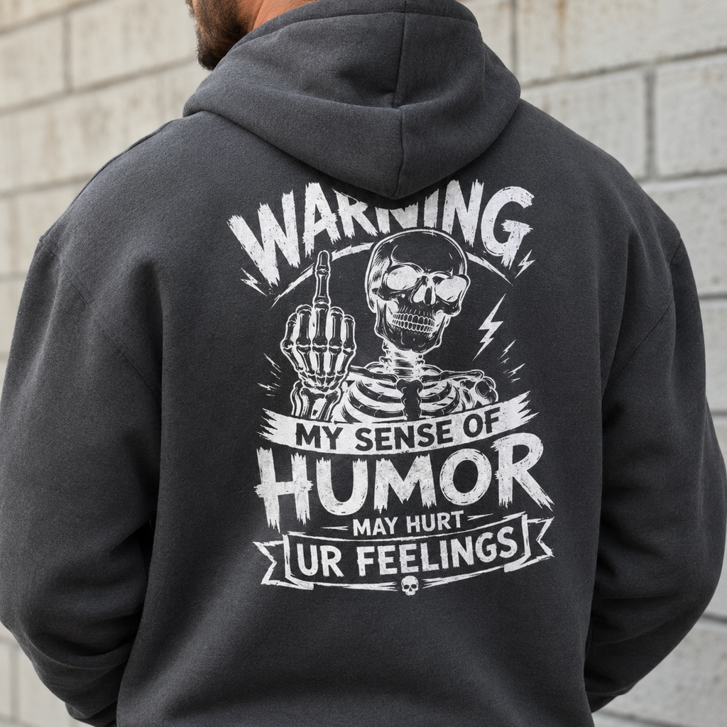 Dark gray skeleton humor hoodie close up showing bold white back print, Warning My Sense of Humor May Hurt Ur Feelings sweatshirt, sarcastic hoodie for men, funny graphic pullover, edgy joke apparel, rude humor gift, streetwear hoodie, back print sweatshirt for casual fall winter outfits.