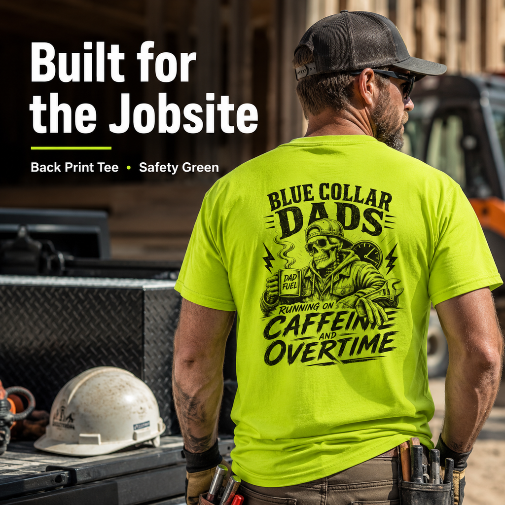 Man wearing a bright green 'Blue Collar Dads' t-shirt with construction-themed text, standing on a jobsite.