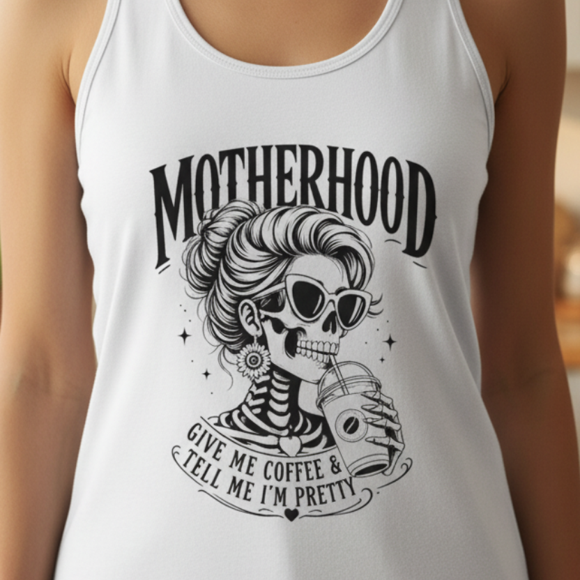 White women’s racerback tank top featuring a bold black Motherhood graphic with a stylish skeleton mom wearing sunglasses and holding an iced coffee. The design reads “Give Me Coffee & Tell Me I’m Pretty,” creating a funny mom-life shirt for coffee-loving mothers, busy moms, birthdays, Mother’s Day gifts, casual summer outfits and everyday wear.