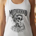 White women’s racerback tank top featuring a bold black Motherhood graphic with a stylish skeleton mom wearing sunglasses and holding an iced coffee. The design reads “Give Me Coffee & Tell Me I’m Pretty,” creating a funny mom-life shirt for coffee-loving mothers, busy moms, birthdays, Mother’s Day gifts, casual summer outfits and everyday wear.